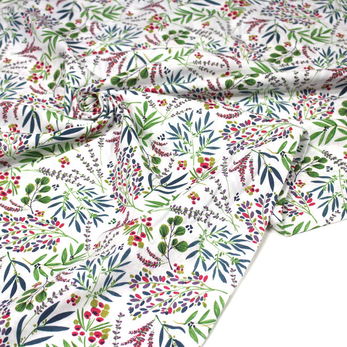 Tissu cotonnade blanc aux fleurs vertes, bleues, mauves - OEKO - TEX - TissusPapi.com