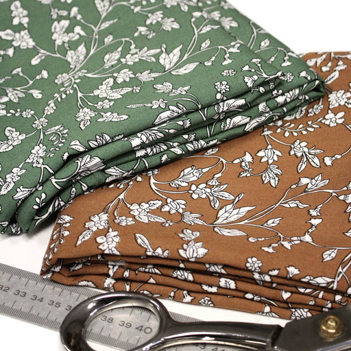 Tissu viscose fluide, fines fleurs blanches et noirs, fond ocre ou fond vert - TissusPapi.com