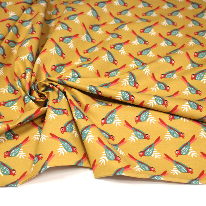 Tissu cotonnade jaune aux oiseaux verts et rouges - OEKO-TEX STANDARD 100