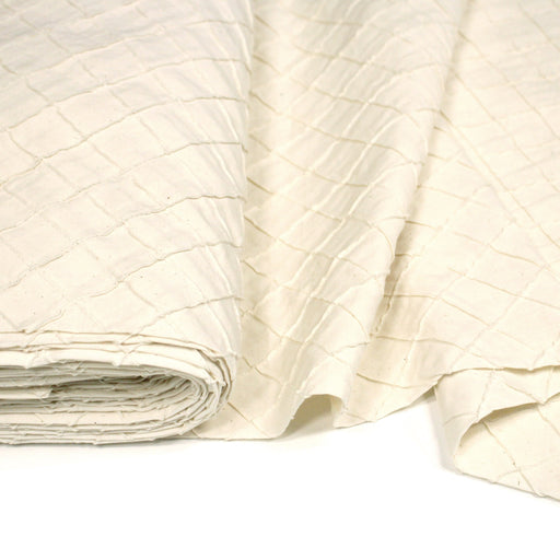 Tissu écru aux carrés cousus façon patchwork - TissusPapi.com