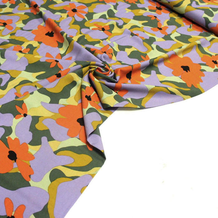 Tissu Viscose fluide AIMEE aux fleurs graphiques vertes, oranges et mauves - OEKO - TEX STANDARD 100 - TissusPapi.com