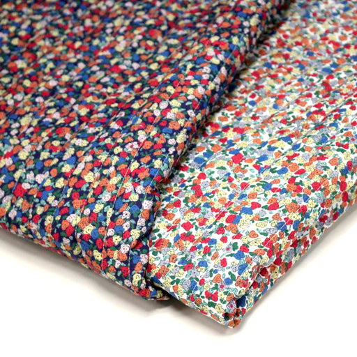 Tissu matelassé FLEURI fines fleurs : fond bleu ou fond blanc - OEKO - TEX - TissusPapi.com