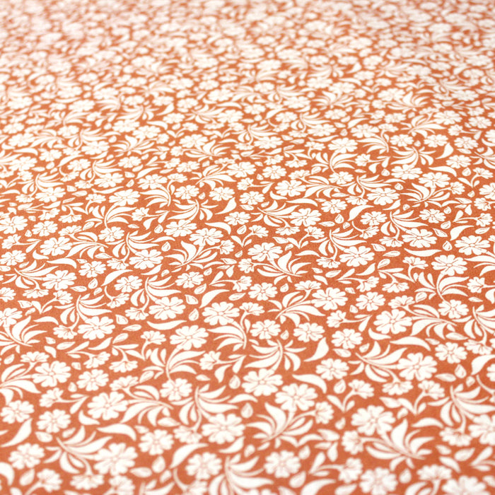 Tissu de coton fleuri, orange aux fleurs blanches - OEKO-TEX