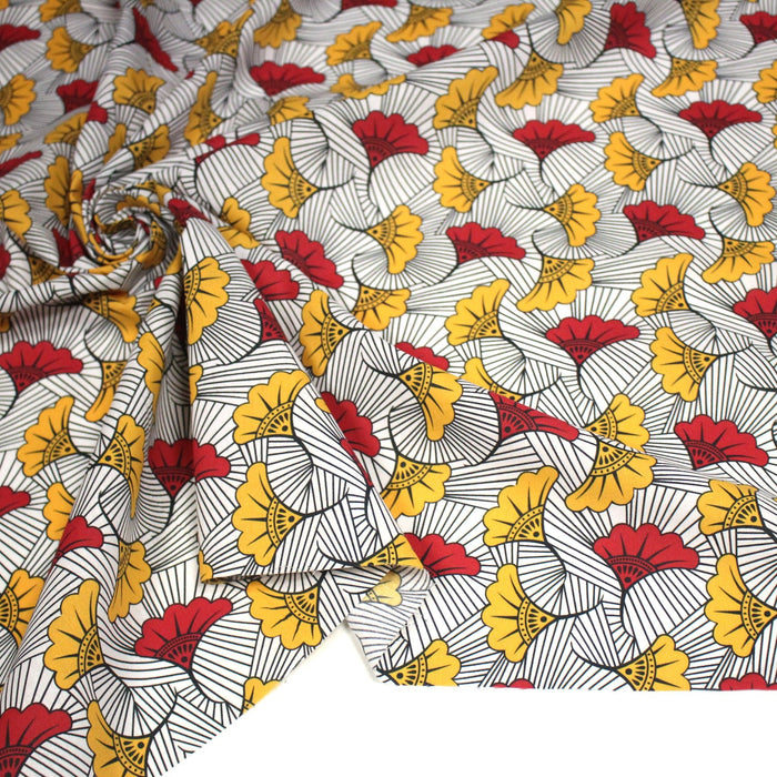 Tissu cotonnade motif WAX floral, fleurs rouges et jaunes - OEKO - TEX STANDARD 100 - TissusPapi.com
