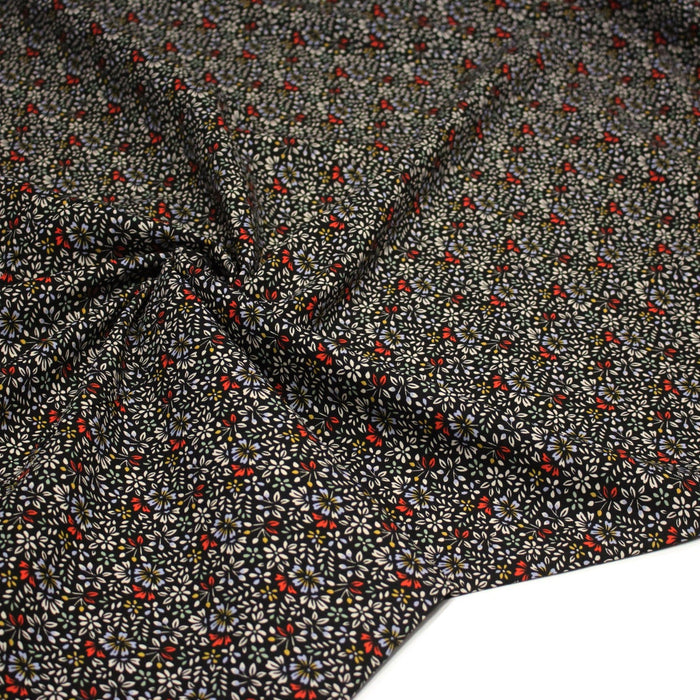 Tissu popeline de viscose noir aux fines fleurs blanches, mauves et rouge - Fabrication française - OEKO - TEX - TissusPapi.com