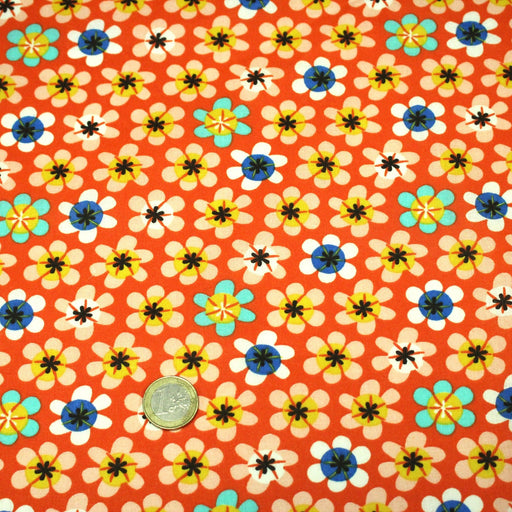Tissu cotonnade orange aux fleurs multicolores - OEKO - TEX STANDARD 100 - TissusPapi.com