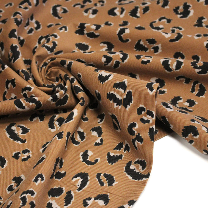 Tissu velours milleraies imprimé léopard havane & noir - STANDARD 100 OEKO-TEX