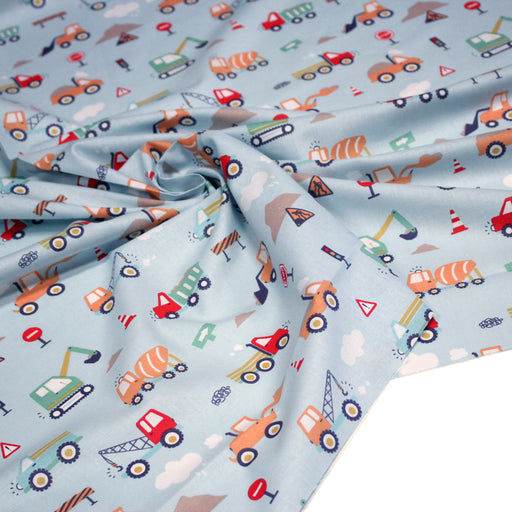 Tissu cotonnade enfant bleu aux grues, camions et tracteurs - STANDARD 100 OEKO - TEX - TissusPapi.com