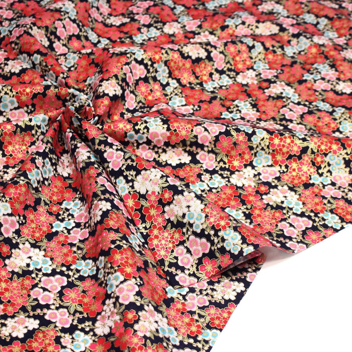 Tissu cotonnade bleu marine aux fleurs sakura rouges blanches et dorées - COLLECTION JAPON DORÉ - TissusPapi.com