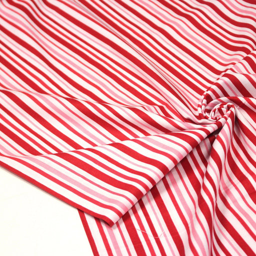 Tissu cotonnade aux rayures rouges, roses et blanches - TissusPapi.com