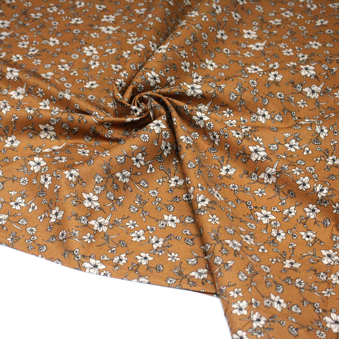 Tissu popeline coton ocre aux fines fleurs écrues & noires - OEKO - TEX - TissusPapi.com
