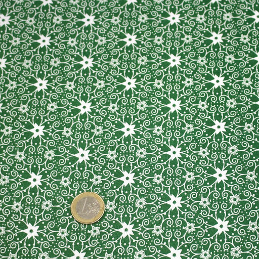 Tissu de Noël cotonnade vert aux motifs géométriques blancs de Noël - TissusPapi.com