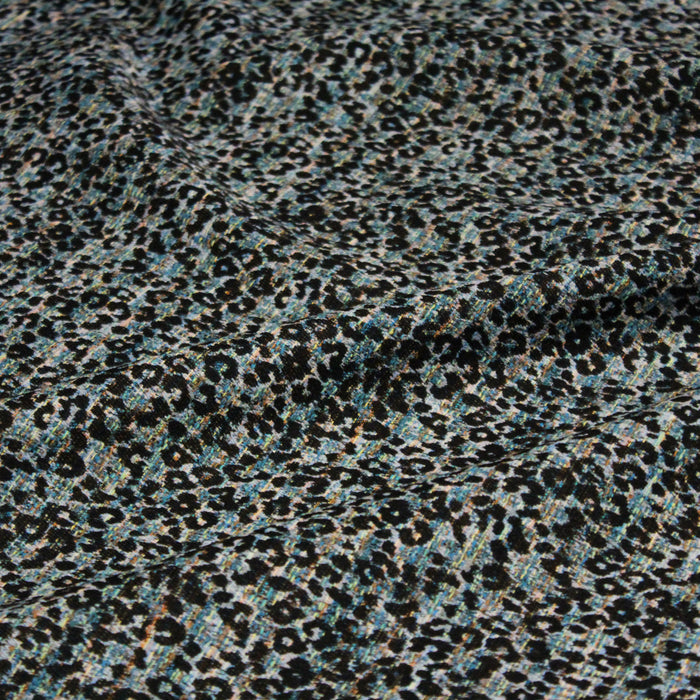 Tissu jacquard motif léopard noir sur fond faux uni vert bleu - COLLECTION LEOPARD