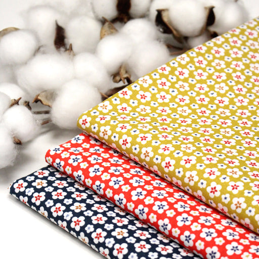 Tissu cotonnade fleurs japonaises géométriques : bleu, jaune, vert, rouge - OEKO - TEX - TissusPapi.com