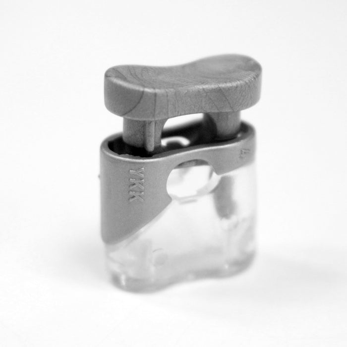 Bloque cordon YKK - Stop cordon gris clair & transparent, 1 trou, YKK - TissusPapi.com