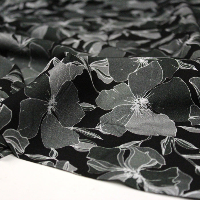 Tissu viscose fluide noir aux fleurs grises - OEKO-TEX®