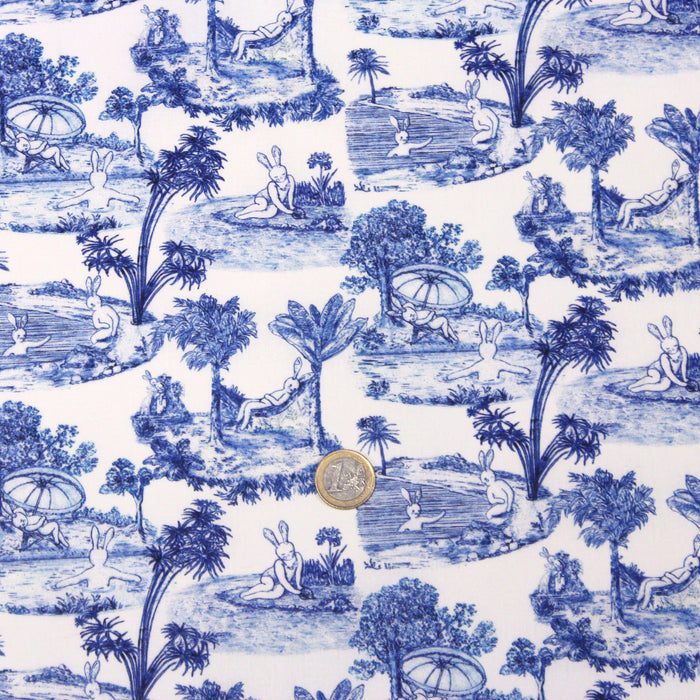 Tissu Toile de jouy de coton aux motifs Lapinous coquins bleus