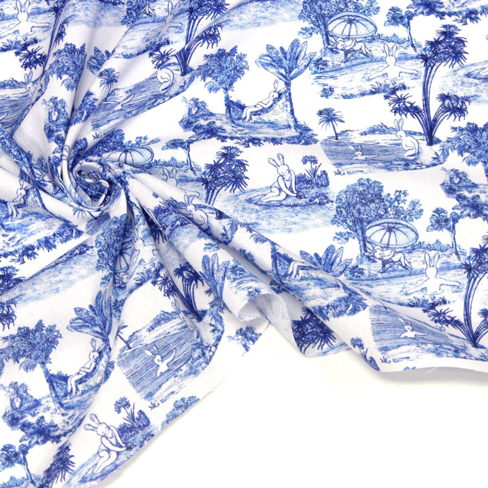 Tissu Toile de jouy de coton aux motifs Lapinous coquins bleus - TissusPapi.com