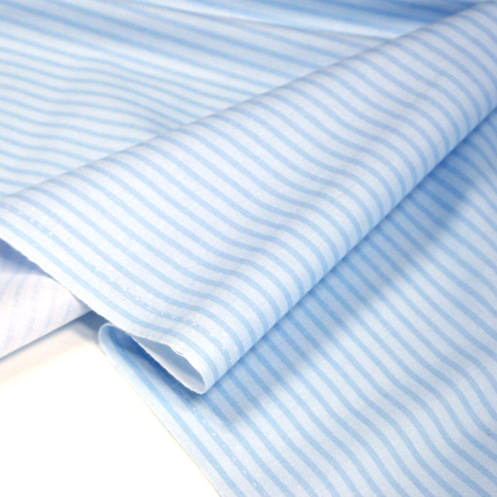 Tissu cotonnade aux rayures bleu ciel - TissusPapi.com