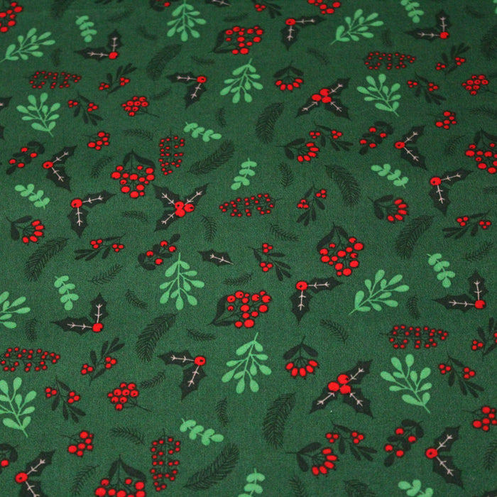 Tissu de coton de Noël vert aux feuilles de houx vertes et branches de sapins verts - COLLECTION NOËL - OEKO - TEX - TissusPapi.com