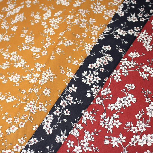 Tissu cotonnade HANA HANA, fleurs de cerisier japonais noir & blanc, fond rouge / bleu / jaune - OEKO - TEX - TissusPapi.com