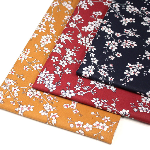 Tissu cotonnade HANA HANA, fleurs de cerisier japonais noir & blanc, fond rouge / bleu / jaune - OEKO - TEX - TissusPapi.com