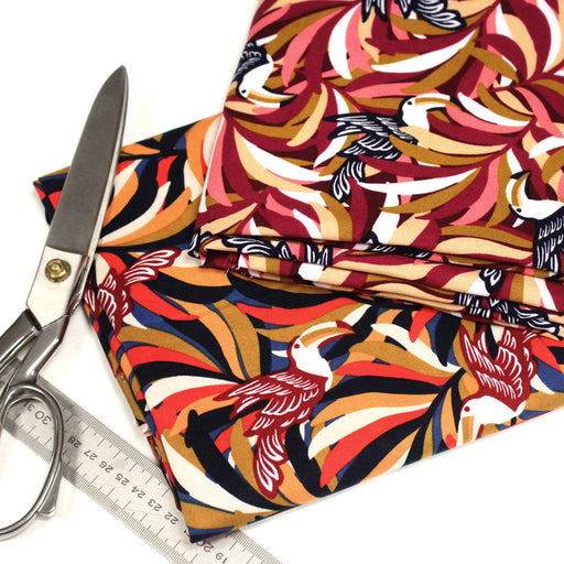 Tissu viscose fluide, motif floral & toucans : tons prune ou tons marine - OEKO - TEX STANDARD 100 - TissusPapi.com