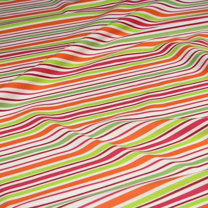 Tissu Bayadère de coton aux rayures oranges, rouges et roses, fond blanc - TissusPapi.com