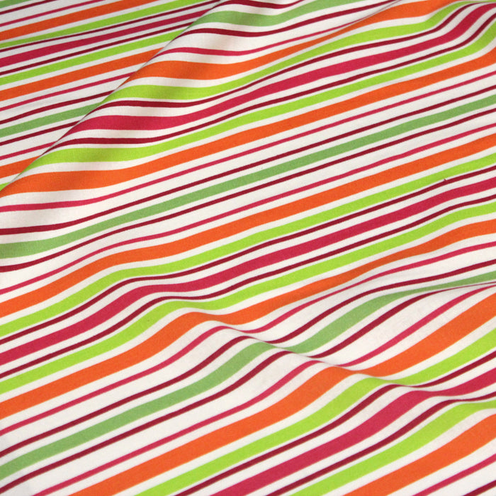 Tissu Bayadère de coton aux rayures oranges, rouges et roses, fond blanc - TissusPapi.com