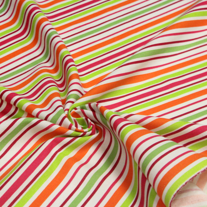 Tissu Bayadère de coton aux rayures oranges, rouges et roses, fond blanc - TissusPapi.com
