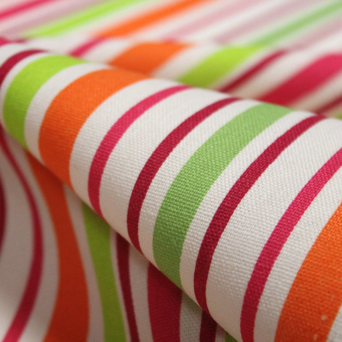 Tissu Bayadère de coton aux rayures oranges, rouges et roses, fond blanc - TissusPapi.com