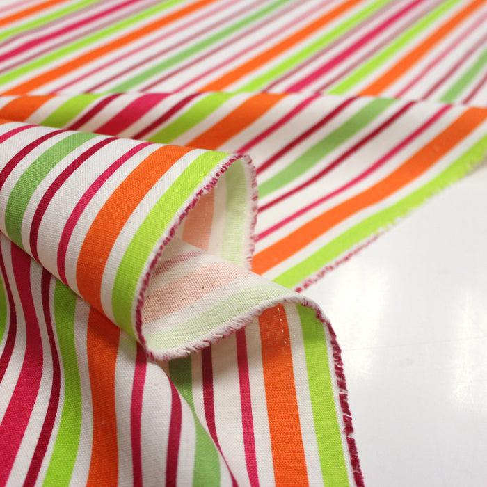 Tissu Bayadère de coton aux rayures oranges, rouges et roses, fond blanc - TissusPapi.com