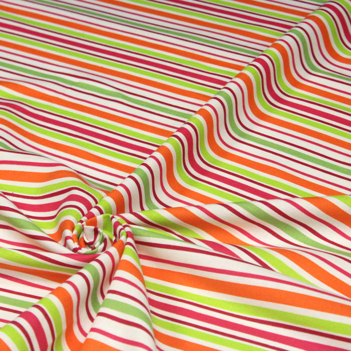 Tissu Bayadère de coton aux rayures oranges, rouges et roses, fond blanc - TissusPapi.com