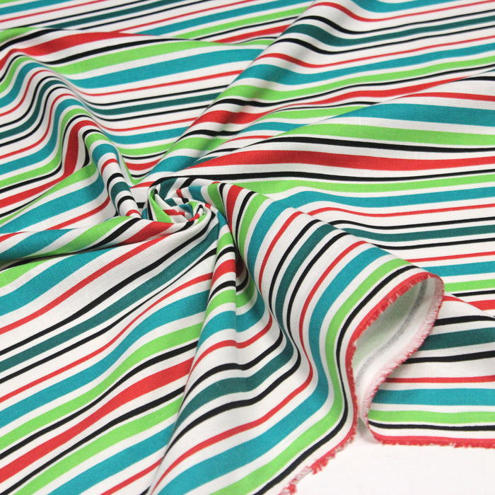 Tissu Bayadère de coton aux rayures vertes, rouges et noires, fond blanc - TissusPapi.com