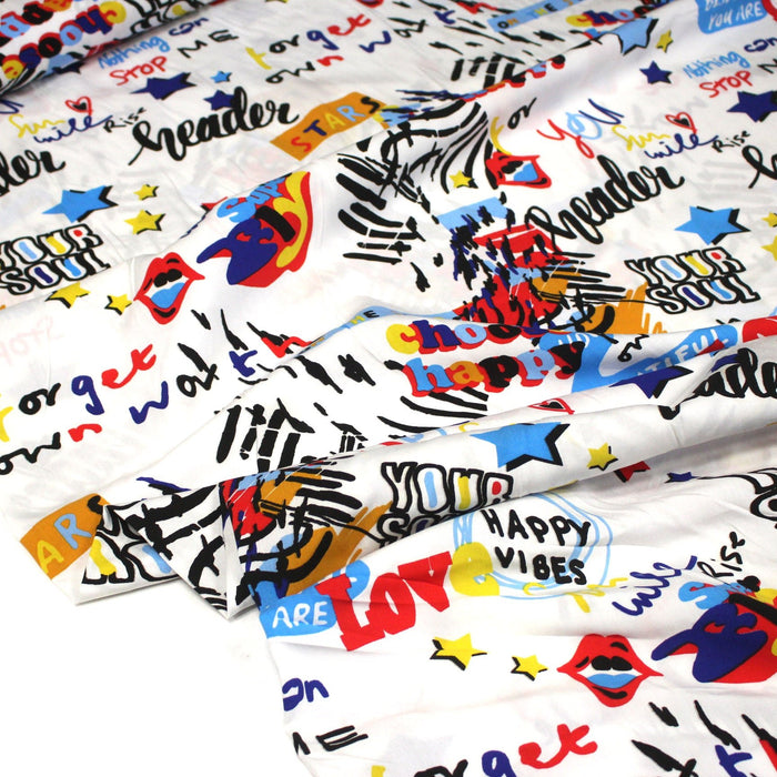 Tissu popeline de viscose blanc aux graffiti multicolores - Fabrication française - OEKO - TEX - TissusPapi.com