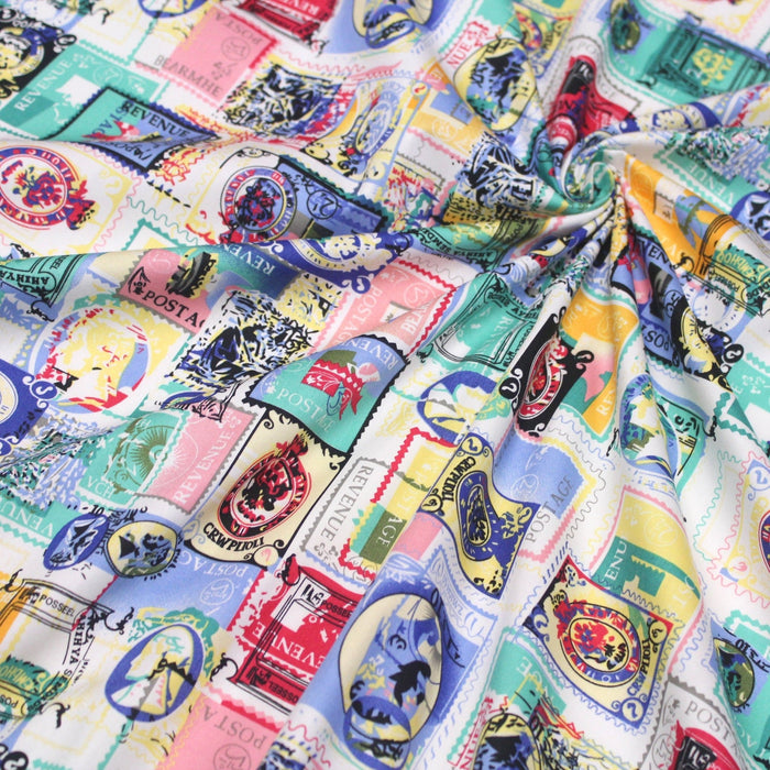 Tissu popeline coton Timbres britanniques multicolores - TissusPapi.com