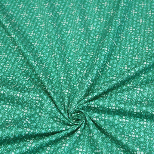 Tissu popeline de coton JADE, faux - uni aux fleurs vertes - TissusPapi.com