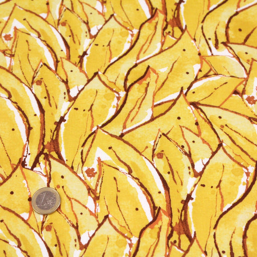 Tissu popeline de coton SUMATRA au feuillage tropical jaune, fond blanc - TissusPapi.com
