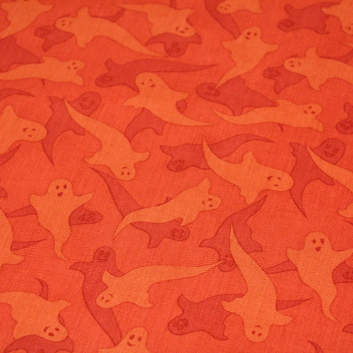 Tissu popeline de coton aux fantômes orange, fond orange - COLLECTION HALLOWEEN - TissusPapi.com
