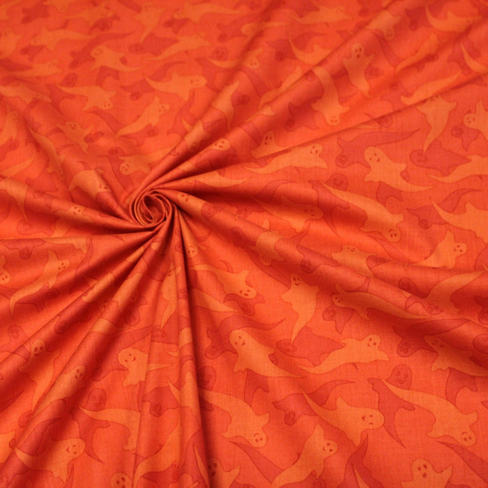 Tissu popeline de coton aux fantômes orange, fond orange - COLLECTION HALLOWEEN - TissusPapi.com