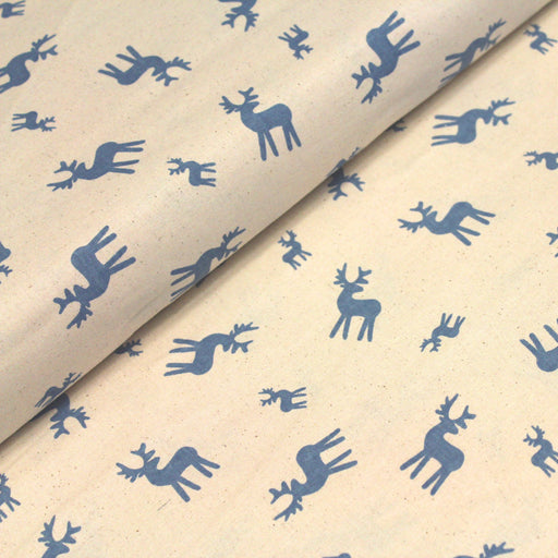 Tissu de coton de Noël scandinave aux rennes bleus, fond écru - tissuspapi