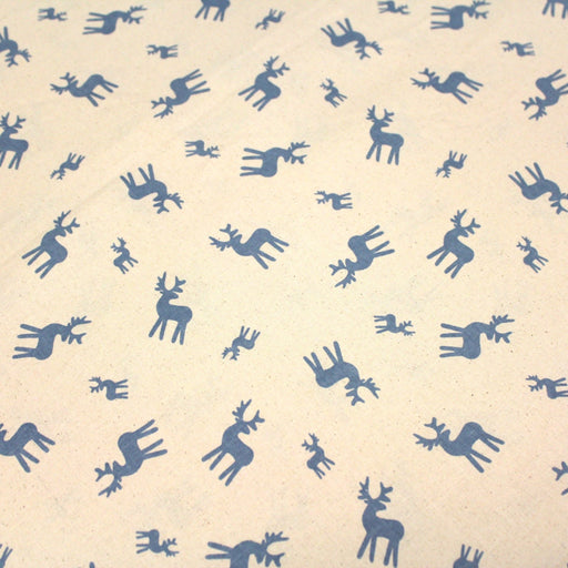 Tissu de coton de Noël scandinave aux rennes bleus, fond écru - TissusPapi.com