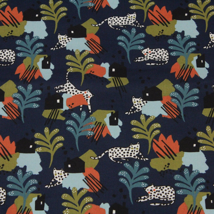 Tissu cotonnade JUNGLE STORY motif tropical & léopard blanc, fond bleu marine - OEKO - TEX®de - TissusPapi.com