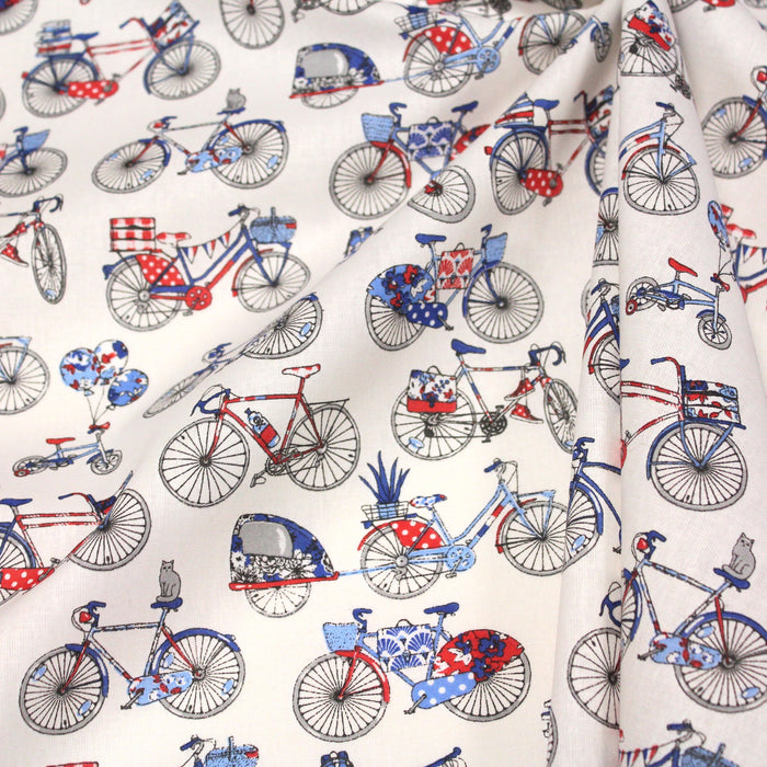 Tissu de coton aux petits vélos tricolores bleus blancs rouges, fond écru - Oeko-Tex