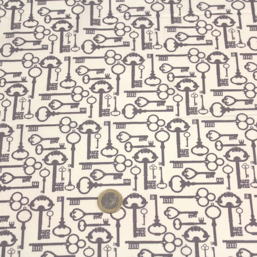 Tissu popeline de coton aux clefs vintage taupe, fond écru - TissusPapi.com