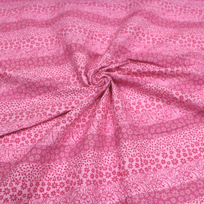 Tissu de coton batik patchwork aux fleurs variées, tons rose et rose fuchsia - TissusPapi.com