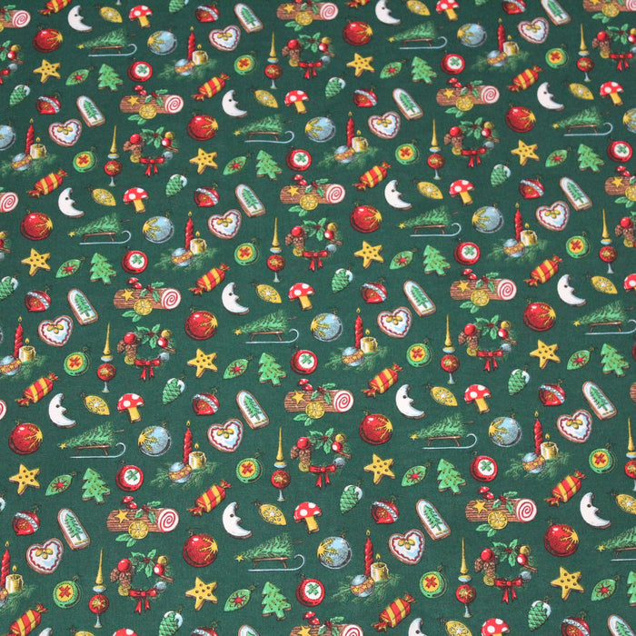 Tissu de coton de Noël aux objets traditionnels, fond vert - Oeko-Tex - tissuspapi