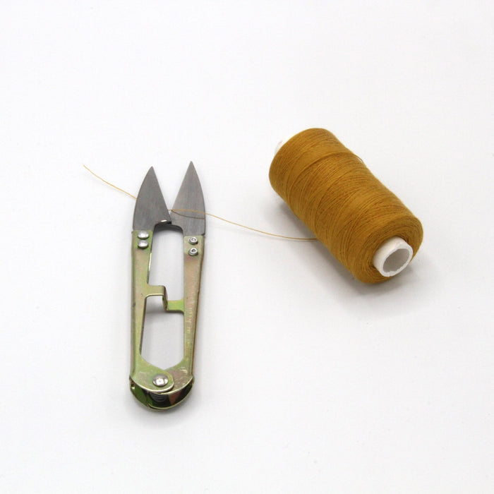 Ciseau coupe fil en métal doré et lames argentées - TissusPapi.com