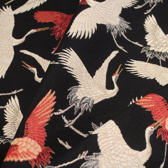 Tissu jacquard motif traditionnel japonais des grues tsuru écrues & rouges, fond noir - Oeko - Tex - TissusPapi.com