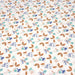 Tissu de coton blanc aux fleurs et pétales bleus, vert d'eau et ocres - OEKO-TEX® - tissuspapi